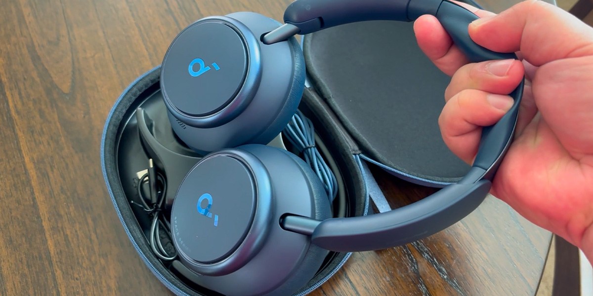 Hand removing Soundcore Space Q45 from case Hand removing Soundcore Space Q45 from case