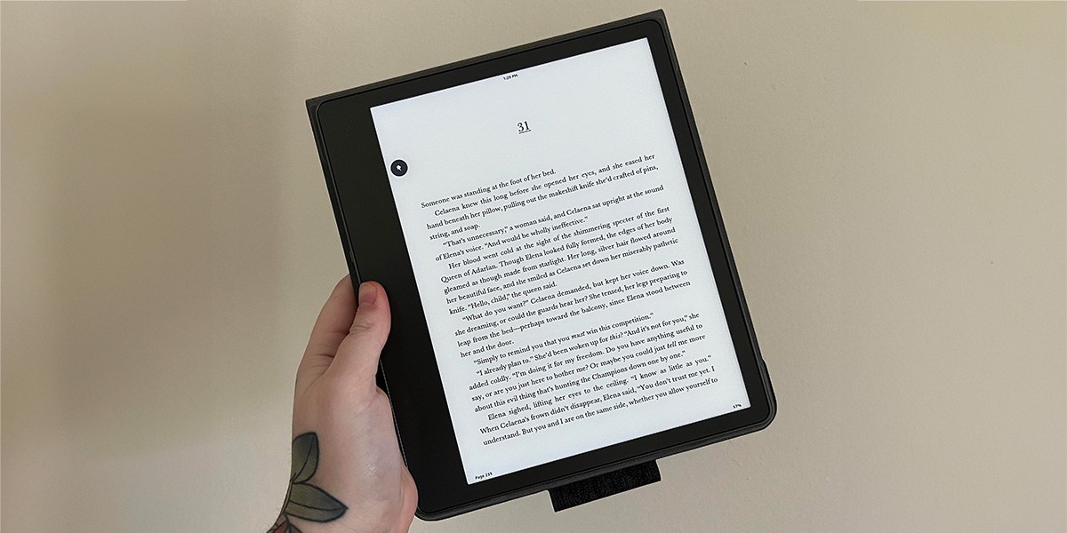 Hand holding Kindle Scribe