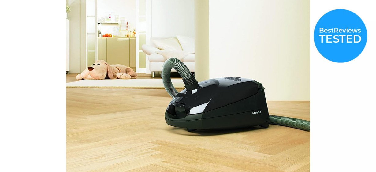 Black Miele Classic C1 on hard flooring