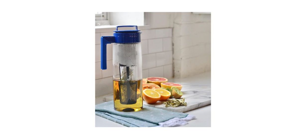 Takeya Iced Tea Maker next to some fruit in a kitchen Takeya Iced Tea Maker next to some fruit in a kitchen
