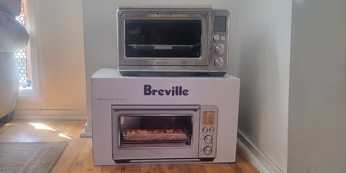 Breville Smart Oven Air Fryer sitting on top of brand packaging Breville Smart Oven Air Fryer sitting on top of brand packaging