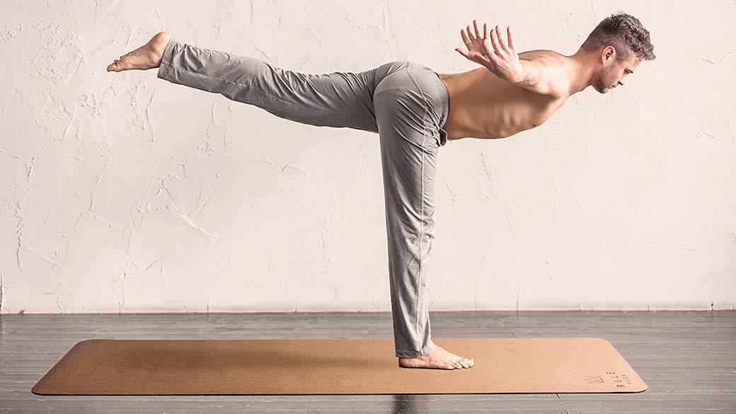 A cork yoga mat with a towel