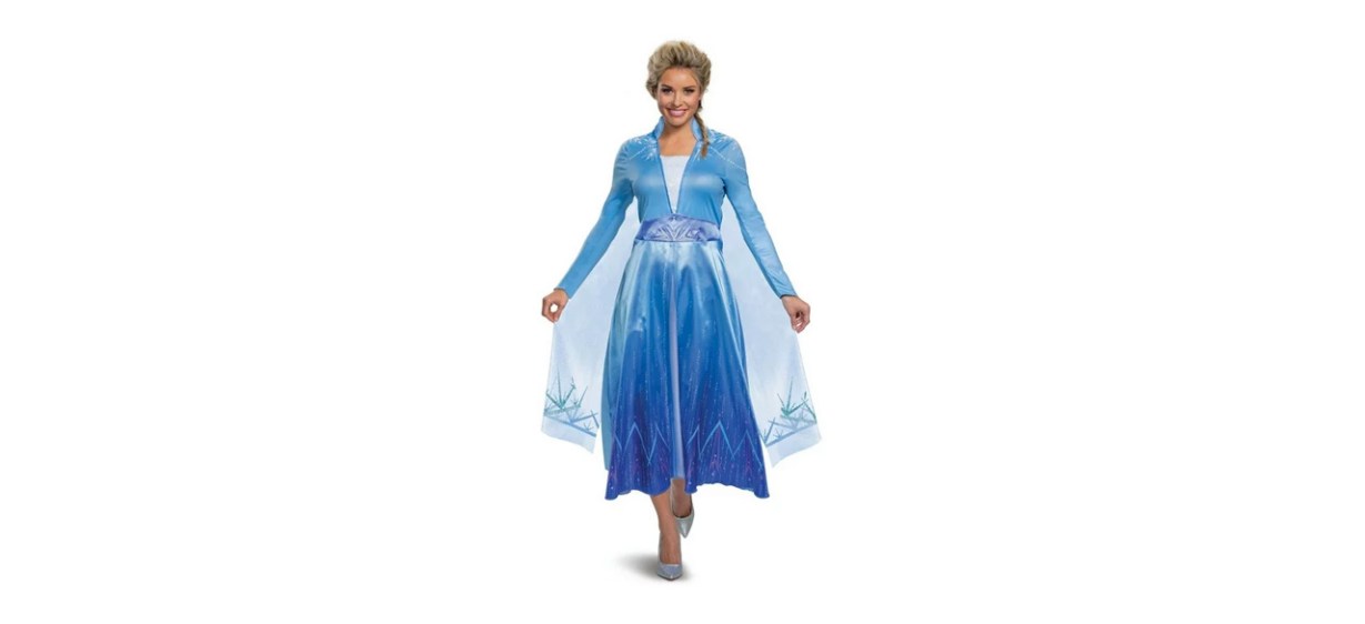 Woman wearing Disney Frozen Elsa costume on white background