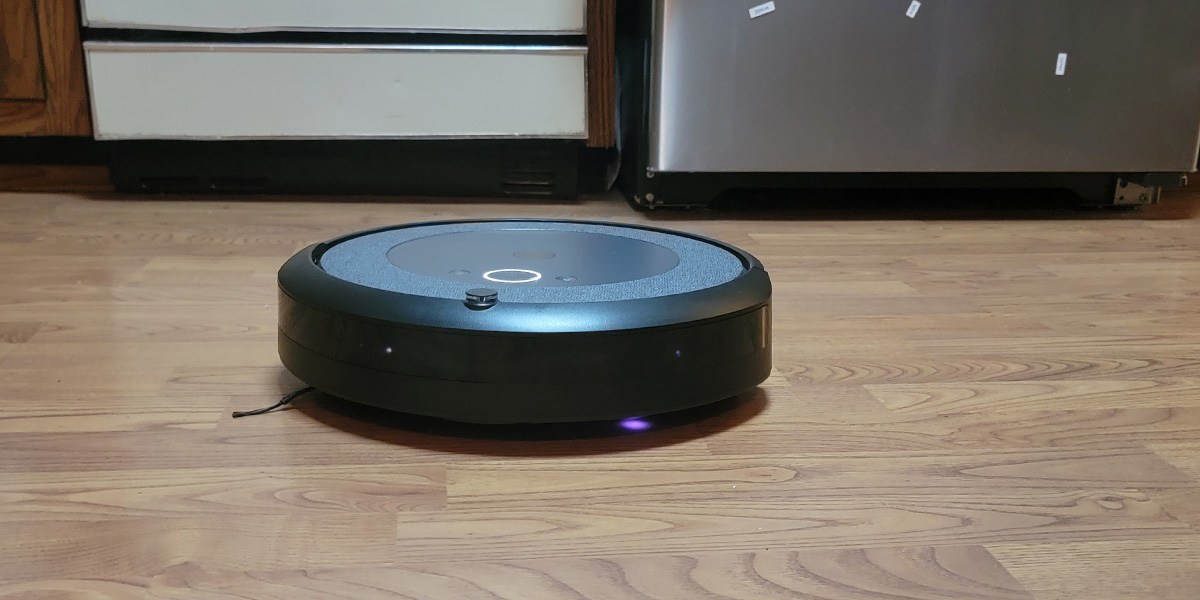 iRobot Roomba i3+ cleaning kitchen floor